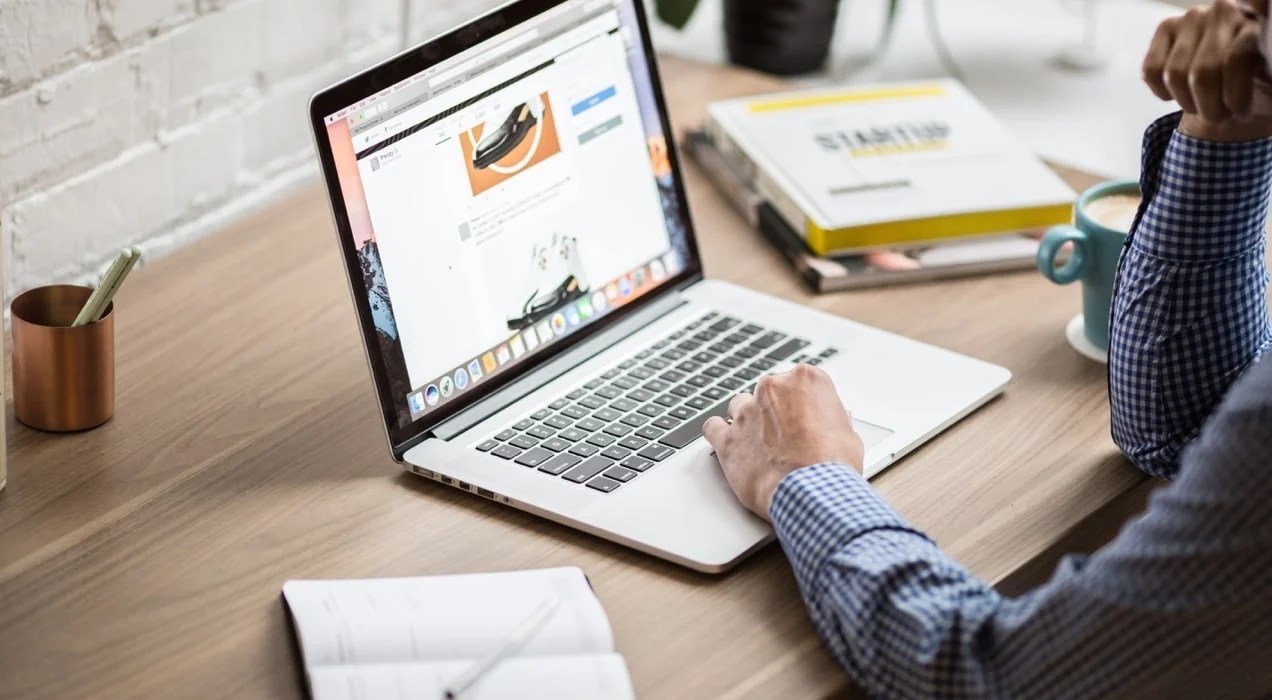 business owner using a laptop