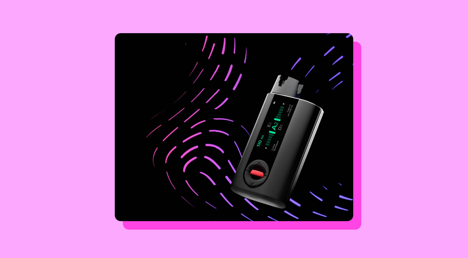 a photo of an electronic guitar tuner on a black and pink background